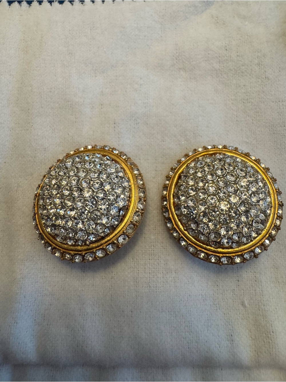 Vintage Jay strongwater  circular gold tone w/clear crystals clip earrings